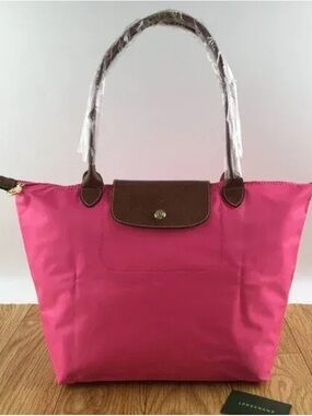 Longchamp Pink Tote with Brown Trim and Handles
